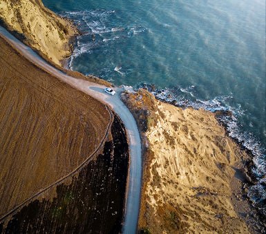 Coastal cliffside road at dusk